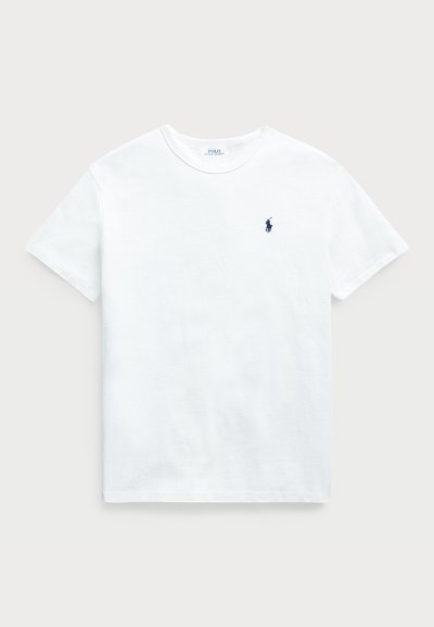 T-shirt bianco in cotone con scollatura rotonda, maniche corte e un piccolo logo navy sul petto sinistro. Tessuto morbido e vestibilità classica.