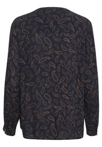 Tengerészkék hosszú ujjú ing arany paisley mintával. Hátsó yoke-dzsel, gombos mandzsettákkal és laza szabással rendelkezik.