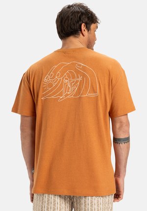 Short-sleeve, orange cotton t-shirt featuring a white graphic of a hand, wave, sun, and surfer on the back. Round neck, relaxed fit.