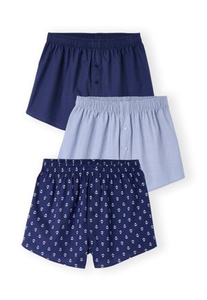 Tres pares de bóxers de hombre con cintura elástica en azul oscuro, azul claro y azul marino con diseños de anclas blancas, cada uno con una bragueta con botones delanteros.