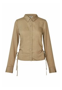Camicia beige a maniche lunghe con bottoni, caratterizzata da una superficie testurizzata e sottili righe verticali, con lacci laterali regolabili e un colletto classico.