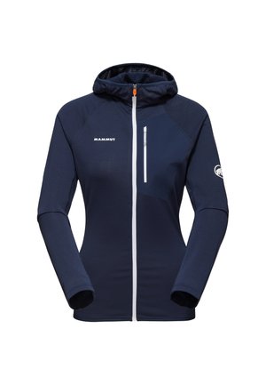 Marinblå fleecejacka med dragkedja framtill, huva och vita detaljer. Innehåller en dragkedjeförsedd bröstficka och strukturerad textil.