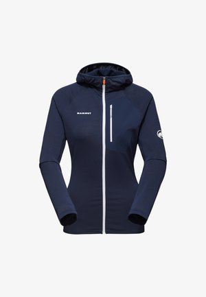 Granatowa polarowa kurtka z zamkiem z przodu, kapturem i białymi akcentami. Posiada kieszeń na zamek na piersi oraz fakturowany materiał.