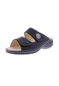 Black slide sandals with two adjustable straps, open toe design, and a round silver accent. Soft insole with white stitching detail.