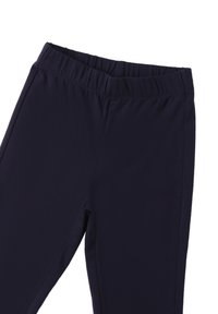 Marineblauwe leggings met een elastische tailleband, gemaakt van een soepele, rekbare stof; aansluitend design zonder zichtbare sluitingen of patronen.
