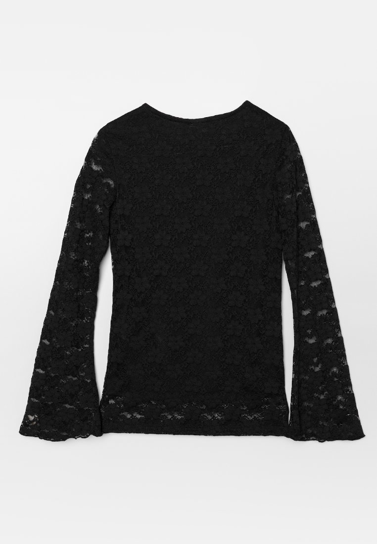 Haut en dentelle noir à manches longues avec un col rond. Il présente des manches évasées et un motif floral en dentelle sur toute sa surface. Tissu doux et texturé.