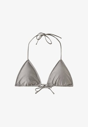 Haut de bikini triangle gris à petits pois blancs, noué avec de fines bretelles au cou et dans le dos.