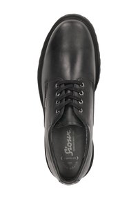 Scarpa in pelle nera con lacci, punta tonda, superficie liscia, suola in gomma e design minimalista. Presenta una fodera interna con marchio.