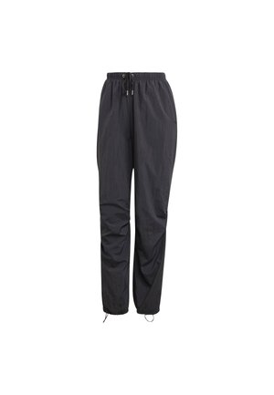 Black, lightweight, and water-resistant pants with an elastic waistband, drawstring closure, and adjustable cuffs. Smooth texture, relaxed fit.