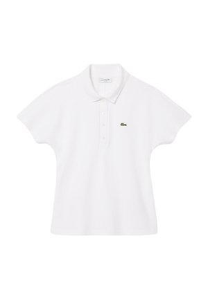 Hvid polo shirt lavet af struktureret bomuld, med krave, kortærmede og et lille grønt broderet krokodillelogo på brystet.