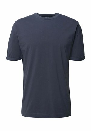 Granatowy t-shirt z krótkim rękawem wykonany z miękkiej bawełny, z okrągłym dekoltem i podwiniętymi mankietami, o luźnym kroju i bezszwowej konstrukcji.