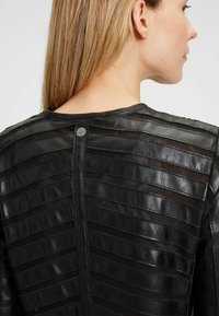 Mauritius GGSURI LELEV - Leren jas - black