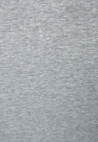 Gray cotton fabric with a smooth texture and subtle heather pattern, featuring fine knit with slight variations in color intensity.