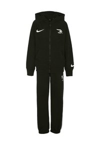 Set di felpa con cappuccio e pantaloni tuta neri. Tessuto morbido, chiusura con zip, tasche a marsupio, polsini a coste e loghi bianchi sul petto e sulla gamba.