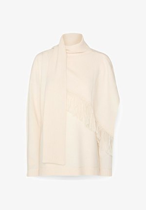 Crème-kleurige pullover met een geribde col, een sjaakopname en een diagonale franjerand aan de zijkant. Zacht, geweven textiel.