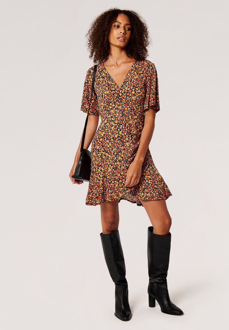 mustard dress with brown boots Midi Dress combined with Cowboy Boots || Fashionblog Berlin