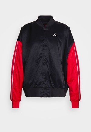 Black satin bomber jacket featuring red satin sleeves, white stripes, and a Jumpman logo. Ribbed cuffs and waistband complete the design.