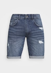 Pantalones cortos de mezclilla en azul oscuro con zonas desgastadas y detalles desgastados. Cuenta con cinco bolsillos, un dobladillo enrollado y un cierre frontal de botón de metal.