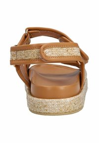 Bruine leren sandalen met een geweven jute platformzool, verstelbare band en een glad voetbed; beschikt over een gestroomlijnd, minimalistisch ontwerp.