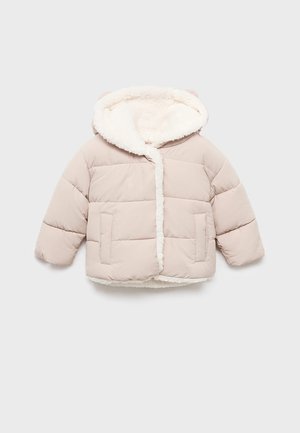Doudoune beige clair avec une capuche en fourrure amovible, poches avant et design court. Texture douce et motif matelassé.