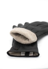 Schwarze Lederhandschuhe mit einem cremefarbenen Strickbund, die eine glatte Textur und gestickte Details aufweisen. Enthalten ist ein kleiner runder Knopf am Handgelenk.