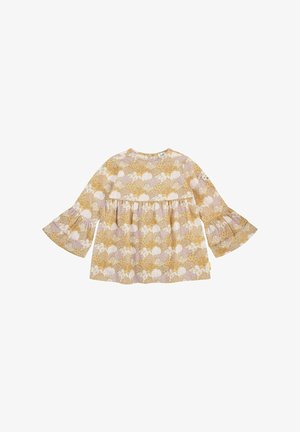 Žlutý top s zvonovými rukávy, zdobený květinovým a vlnovým vzorem v růžové a bílé barvě. Vyrobeno z lehké tkaniny s volným střihem.