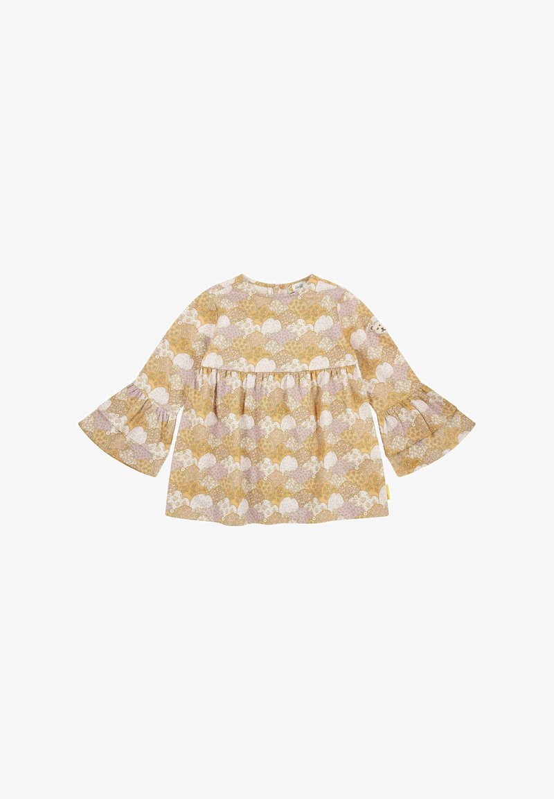 Haut jaune avec des manches en cloche, arborant un motif floral et en vagues en rose et blanc. Fabriqué en tissu léger avec une coupe ample.