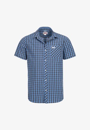 Chemise à manches courtes à boutons, en motif check bleu et noir. Comprend une poche avant et un logo sur la poitrine. Fabriquée en tissu coton.