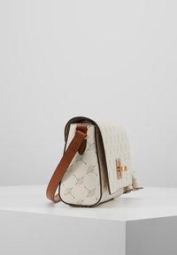 Beige leather crossbody bag with embossed pattern, brown leather strap, and gold hardware. Structured shape with flap closure.