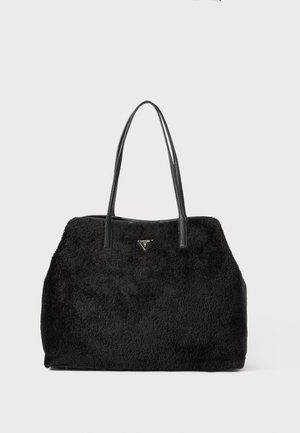 Sort plyss tote bag med en tekstureret overflade, læderhåndtag og en trekantet logo accent. Storslået design med blødt, fuzzy materiale.