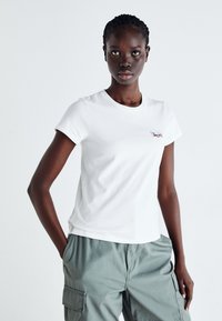 Levi's® THE PERFECT TEE - Marškinėliai su spaudiniu - bright white