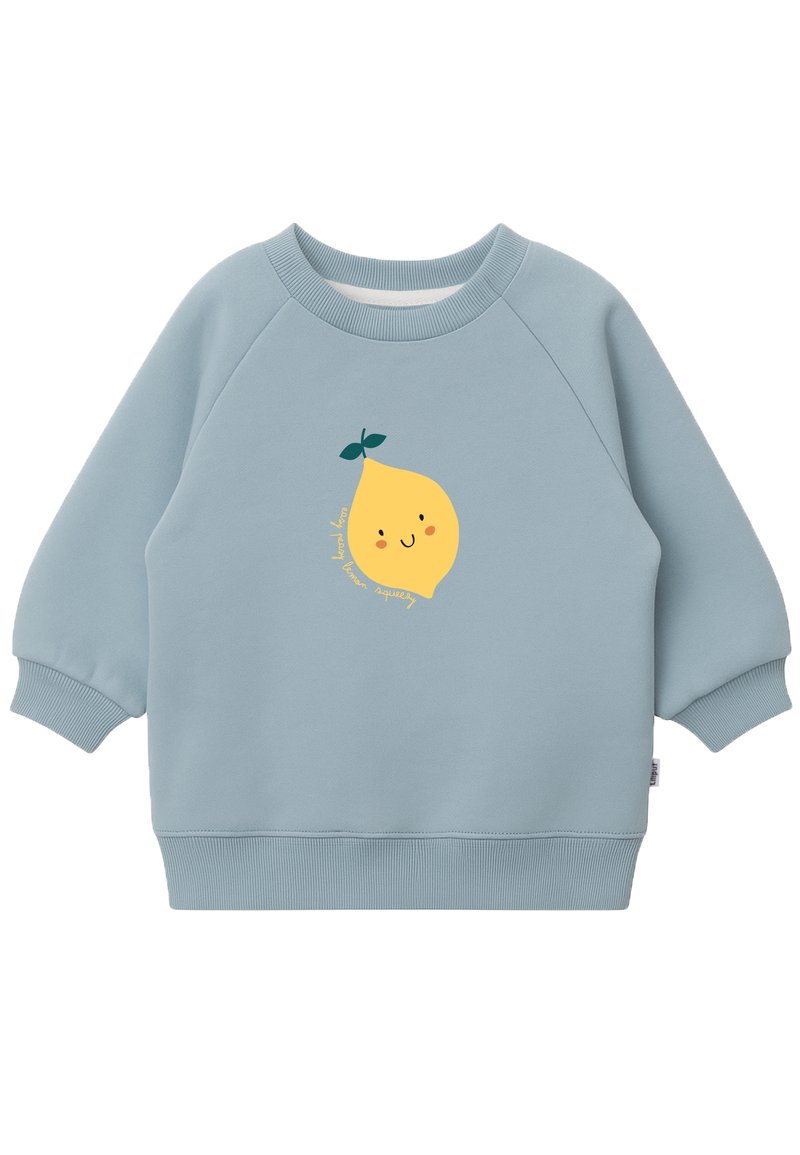 Hellblaues Sweatshirt mit Raglanärmel, ausgestattet mit einem gelben Cartoon-Zitronen-Graphic und Text darunter. Der Stoff sieht weich aus und hat einen gerippten Bund.