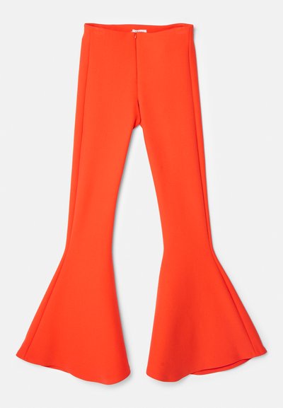Bright orange flared pants made of smooth, stretchy fabric. Features a high waistband and a zipper closure at the back.