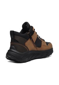 Brown and black hiking shoe made of leather and mesh, featuring a high ankle design, laces, and a zip closure on the side.