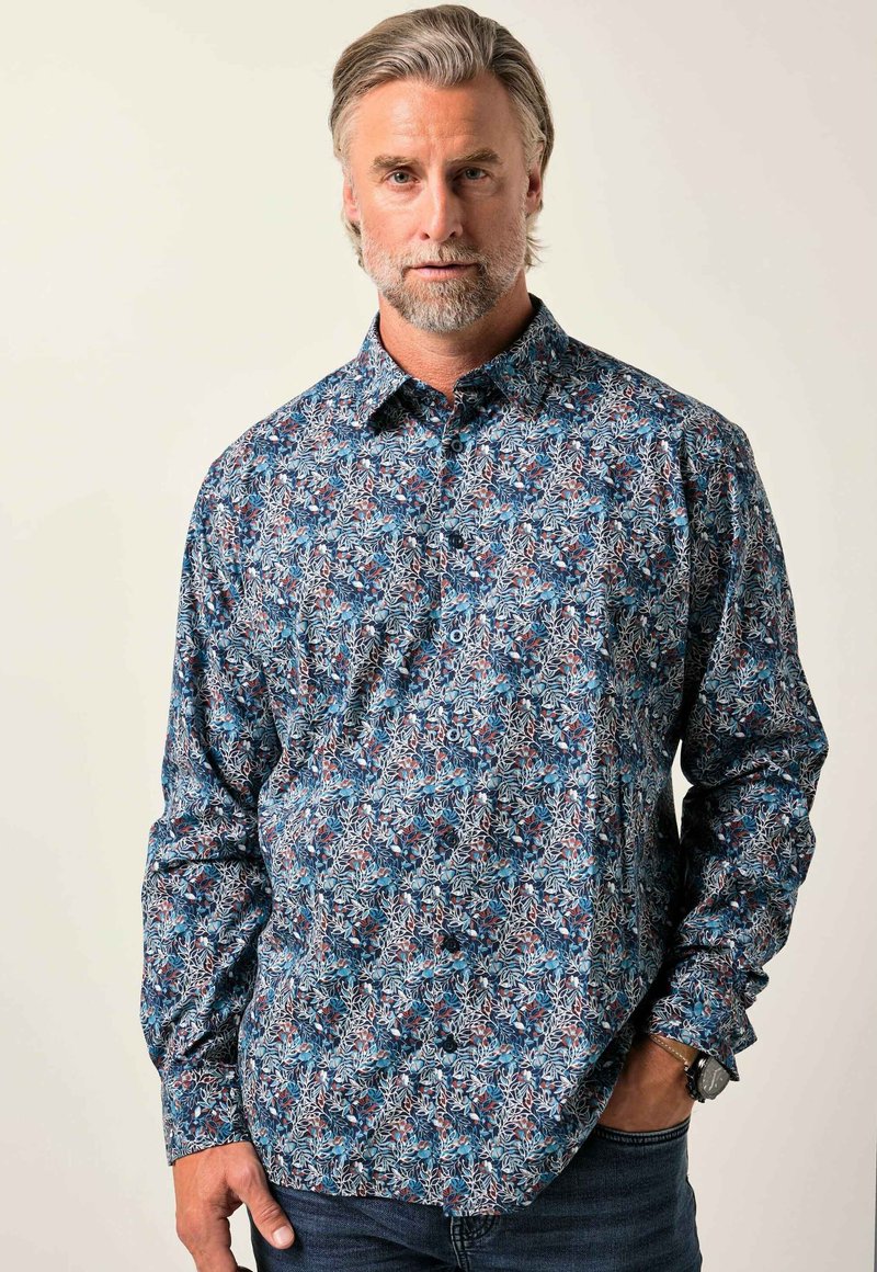 Camicia con bottoni con motivo floreale blu, maniche lunghe e colletto, realizzata in tessuto leggero con vestibilità comoda.