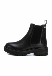 Carmela Botines con plataforma - black