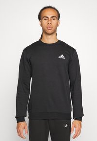 adidas Sportswear - ESSENTIALS - Športni pulover - black/white Miniaturna slika 1