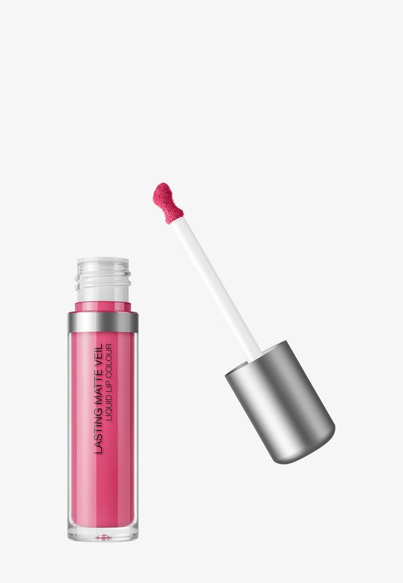 Vaaleanpunainen nestemäinen huulipuna hopeakorkilla ja vinolla applikaattorilla, merkitty "Lasting Matte Veil Liquid Lip Colour" kirkkaassa putkilossa.
