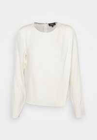 Blouse blanche en soie à manches longues, col rond, légers plis aux épaules et fermeture par boutons au dos de la marque Theory en taille small.
