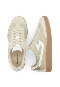 Beige sneakers with glitter accents and white details. Made of suede and synthetic materials, featuring a rubber sole and lace-up design.