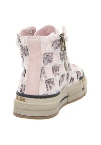 Pink ankle boot with textured fabric, glitter accents, and a side zipper. Features a rubber sole and decorative stitching details.