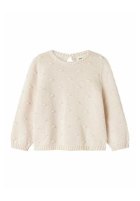 Lys kremfarget genser med rund hals, lange ermer og teksturerte bobble-detaljer. Har lukking med nøkkelhull bak. Strikket stoff.