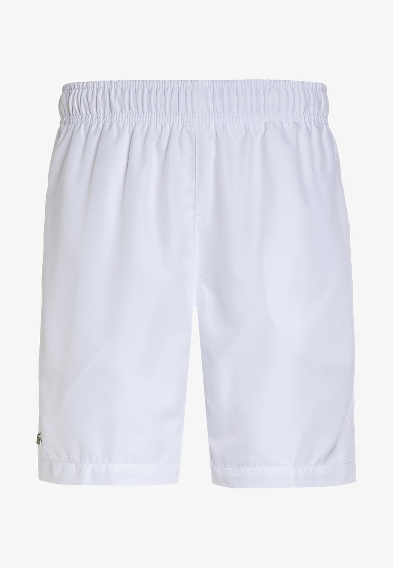 Short de sport blanc à taille élastique avec un design simple et un petit logo près de l'ourlet inférieur sur la jambe gauche.