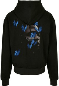 Black hoodie with a front pocket, featuring a large graphic of butterflies and a face on the back, soft fabric, and ribbed cuffs.
