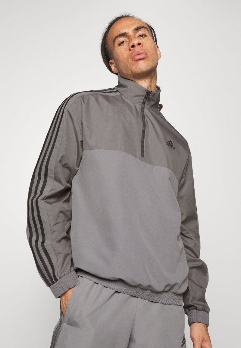 adidas tracksuit bottoms with zip