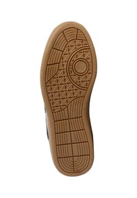 Suola di scarpa in gomma con un motivo testurizzato; colore marrone chiaro con scanalature e dettagli circolari per la trazione.