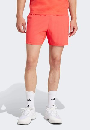 TENNIS 5-INCH ERGO - Sports shorts - semi lucid red