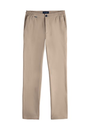Pantalons beige slim-fit avec taille élastique, fermeture à bouton sur le devant, poches latérales et étiquette de marque "MR MARVIS" à la taille.