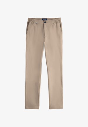 Beige slim-fit pants with elastic waistband, front button closure, side pockets, and brand label "MR MARVIS" at waist.