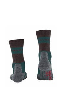Calze grigie e teal con un design a coste. Marchio FALKE in bordeaux, tallone e punta rinforzati, e motivo a righe sulla parte superiore.